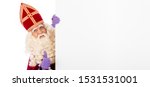 Sinterklaas or saint Nicholas holding blank cardboard. isolated on white background. Dutch character of Santa Claus Small photo of Sinterklaas or saint Nicholas holding blank cardboard. isolated on white background. Dutch character of Santa Claus