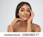 Small photo of Beautiful Girl Facial Skin Care. Smiling Indian Model with Perfect Eyes Make up isolated White. Women Beauty Spa Cosmetology and Treatment. Face Lift and Dermal Filler Cosmetics