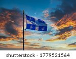 The Flag Of Quebec Flying...