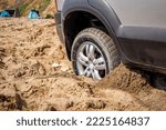 Car Wheel Stuck In Sand On The...