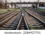 Industrial logistic and transportation concept background, forward railway track switch for train. Railway and industrial area of city. Transportation theme