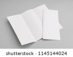 trifold white template paper on ... | Shutterstock . vector #1145144024