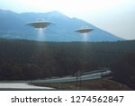 Unidentified flying object. Two UFOs flying over a road among the trees. 3D illustration.