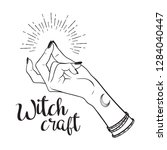 hand drawn witch hand with... | Shutterstock .eps vector #1284040447