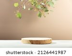 Small photo of Minimal modern product display on neutral beige background. Wood slice podium and green leaves. Concept scene stage showcase for new product, promotion sale, banner, presentation, cosmetic