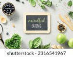 Vegetarian vegan healthy ingredients and mindful eating chalk board on grey stone background. Healthy eating, eco friendly, zero waste concept