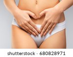 Woman Body Care. Beautiful Healthy Girl With Fit Slim Body Touching Flat Tight Belly. Close-up Of Female In White Panties Holding Hands On Stomach. Feminine Health, Digestion Concept. High Resolution