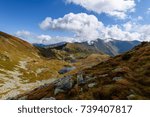 Tatra mountain peak view in Slovakia in sunny day. blue sky with clouds above