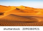 Small photo of A dune landscape in the Rub al Khali or Empty Quarter. Straddling Oman, Saudi Arabia, the UAE and Yemen, this is the largest sand desert in the world.