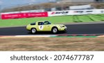 Small photo of Italy, september 11 2021. Vallelunga classic. Historical Alfa Romeo Giulia TZ 60s race car on racetrack blurred motion background