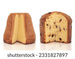 Small photo of Pandoro and panettone italian christmas cakes with slices taken out to reveal inside, over white background.