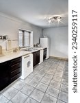 Small photo of colour image kitchen in newly restored rebuilt house work surfaces