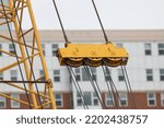 Small photo of Close up view of Industrial Crane mechanical pulleys.