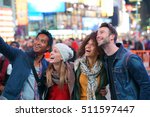 Group of friends having fun at Times Square, NYC                               