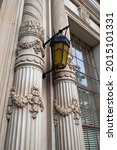 Small photo of BAKERSFIELD, CA - JULY 25, 2021: A close examination of the faux doric columns of the Bakersfield Californian building reveals the ornate details.