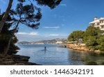 The bay of  Santa Ponca at the island Mallorca in Spain, with Standup Paddle man