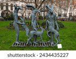 Small photo of London, UK - February 19th 2024: Sculpture entitled Paintpots in St. James's Square, London, created by Sophie Ryder.