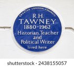 Small photo of London, UK - February 5th 2024: Blue plaque on Mecklenburgh Square in London, UK, marking the location where historian, teacher and political writer R. H. Tawney lived.
