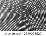 Small photo of An image with black and white dots on background in 3D relief. Abstract dotted. Halftone radial pattern