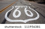 An old Route 66 shield painted on road in United States of America
