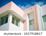 Detail of classic Art Deco architecture with pastel colors under blue sky in South Beach, Miami, Florida