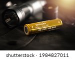 Small photo of The golden INR18650 3.7V rechargeable battery. INR18650 battery is Lithium nickel rechargeable battery with size 18mm by 65mm.