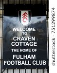 Small photo of LONDON, ENGLAND- 6 MAY 2013: Black sign says "Welcome to Craven Cottage the home of Fulham Football Club" Fulham Football Club is a professional association football club based in Fulham, London, UK