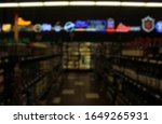 Blur Background Liquor Store...