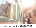 groom and bride in the city on... | Shutterstock . vector #370980587