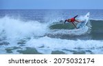 Small photo of JACKSONVILLE BEACH, FL – NOVEMBER 13, 2021. Kirra Pinkerton competes in the Super Girl Surf Pro competition on November 13 at Jacksonville Beach Florida.