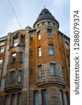 Small photo of Facade of Meltzer Apartment house with tower in Art Nouveau architectural style (Bolshaya Konyushennaya Street, Saint Petersburg, Russia)