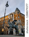 Small photo of Bronze Pegasus horse and Meltzer Apartment house (Bolshaya Konyushennaya Street, Saint Petersburg, Russia)