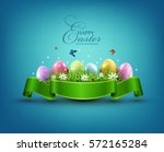 vector easter eggs with grass... | Shutterstock .eps vector #572165284