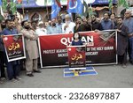 Small photo of HYDERABAD, PAKISTAN - JUL 04: Activists of Jamat-e-Islami (JI) are holding protest demonstration against desecration of Holy Quran in Sweden, at Hyder Chowk on July 4, 2023 in Hyderabad.