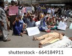 Small photo of KARACHI, PAKISTAN - JUN 21: Staffs of Community Midwives School Government of Sindh are holding protest demonstration against nonpayment of their salaries, on June 21, 2017 in Karachi.