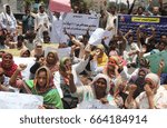 Small photo of KARACHI, PAKISTAN - JUN 21: Staffs of Community Midwives School Government of Sindh are holding protest demonstration against nonpayment of their salaries, on June 21, 2017 in Karachi.