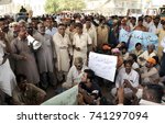 Small photo of KARACHI, PAKISTAN - OCT 24: KMC and DMC workers are holding protest against nonpayment of their salaries, at Habib Chowrangi in SITE area on October 24, 2017 in Karachi.