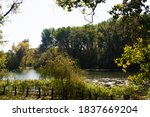 lake in the beautiful wood | Shutterstock . vector #1837669204