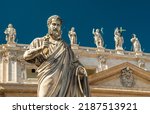 Small photo of St Peter statue on Saint Peter's Basilica background in Vatican City, Rome, Italy. Baroque monument, fine sculpture of Apostle Peter with key close-up. Concept of Rome landmark, Catholicism and faith