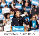 Small photo of New York, NY - October 19, 2019: U.S. Representative Alexandria Ocasio-Cortez speaks during Bernie Sanders Rally "Bernie's Back" in Queensbridge Park. She endoreses him for President of USA