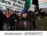 Small photo of New York, NY - November 19, 2021: About 200 protesters rally outside Barclays Center and march along Flatbush Avenue after Rittenhouse acquittal