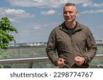 Small photo of Kyiv mayor Vitali Klitschko and Brussels mayor Philippe Close speak to reporters on Glass Bridge at Volodymyrska Hirka in Kyiv on May 5, 2023
