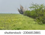 Small photo of Controlled explosion of unexploded munition collected by de-mining unit of National Guards of Ukraine seen in near Kherson in Ukraine on May 22, 2023