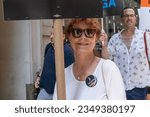 Small photo of Susan Sarandon joined WGA and SAG-AFTRA members to walk picket lines as they strike over contract negotiation at Netflix and Warner Bros. Discovery offices in New York on August 18, 2023.