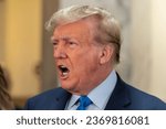 Small photo of Former President Donald Trump speaks to press before the start of civil fraud trial brought by NYS Attorney General Letitia James at NYS court in New York on October 2, 2023