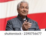Small photo of Jamie Dimon attends ceremony for final steel beam wrapped with American flag and signed by workers and officials raised at JP Morgan Chase new global headquarters in New York on November 20, 2023