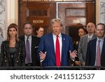 Small photo of Former President Donald Trump speaks to the press before closing arguments at his civil fraud trial at State Supreme Court in New York on January 11, 2024