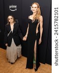 Small photo of Lulu Wang, Nicole Kidman wearing dress by Versace attend Amazon Prime MGM Studios 'Expats' premiere at The Museum of Modern Art in New York on January 21, 2024