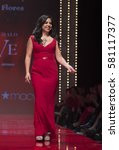 Small photo of New York, NY USA - Feb 9, 2017: Odilia Flores in Black Halo Eve by Laurel Berman walk runway for the Red Dress Collection 2017 by Macys at Hammerstein Ballroom to benefit American Heart Association