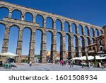 People on the aqueduct wall image - Free stock photo - Public Domain ...